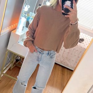 Tan puffy, long sleeve shirt